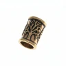 Bronze bead with tree motif