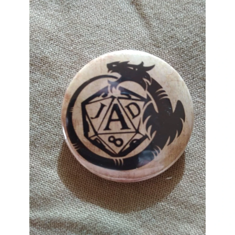 Odznak Jaskyne a draci - čierne logo