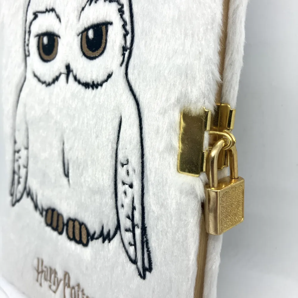 Harry Potter Notizbuch - Plüsch-Hedwig mit Schloss